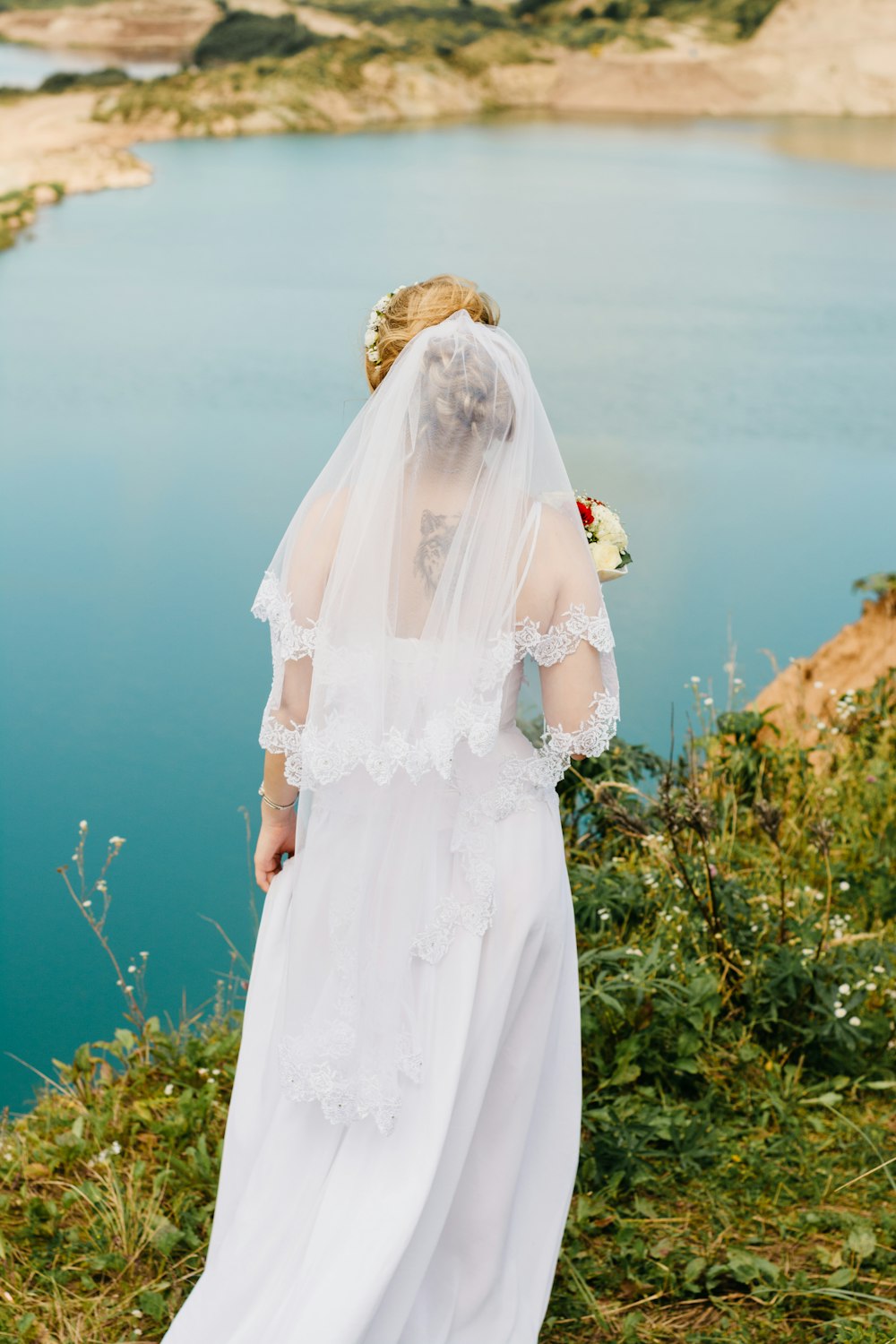 woman standing on cliff