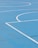 A basketball court showcasing bright, professionally applied stencils and logos.