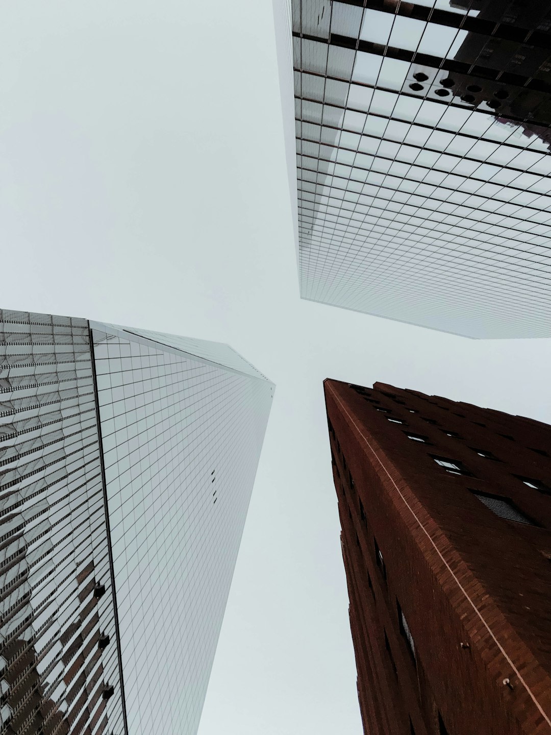 low angle photography of highrise buildings