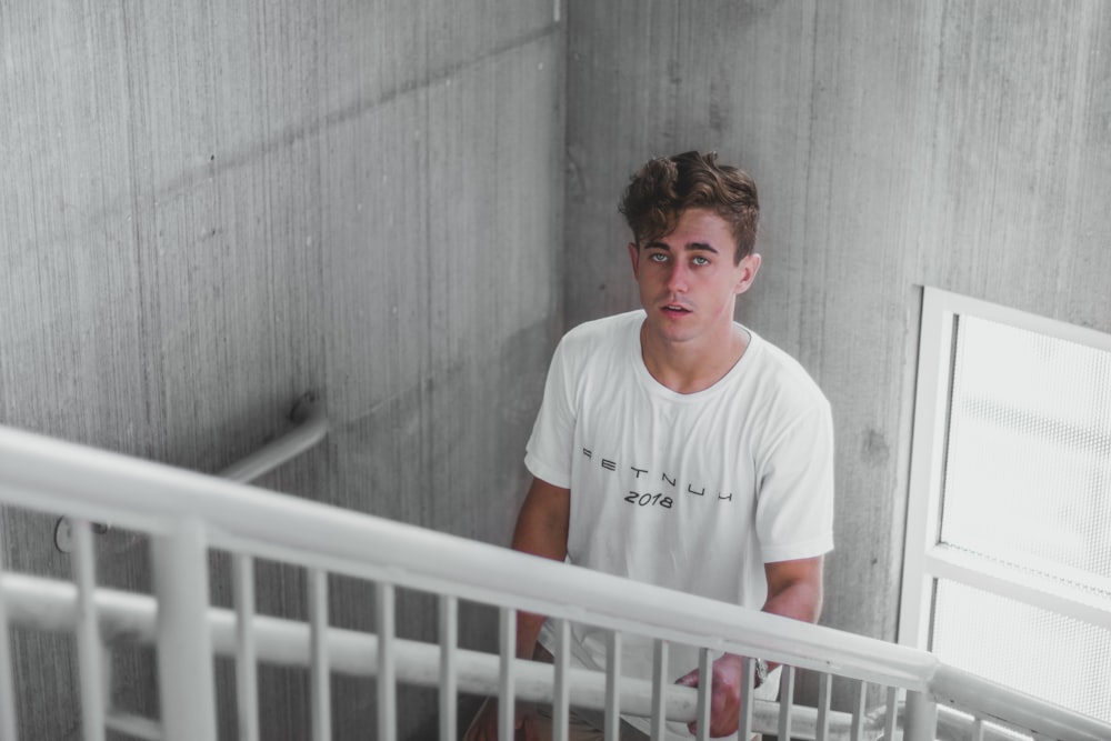 man standing on stair