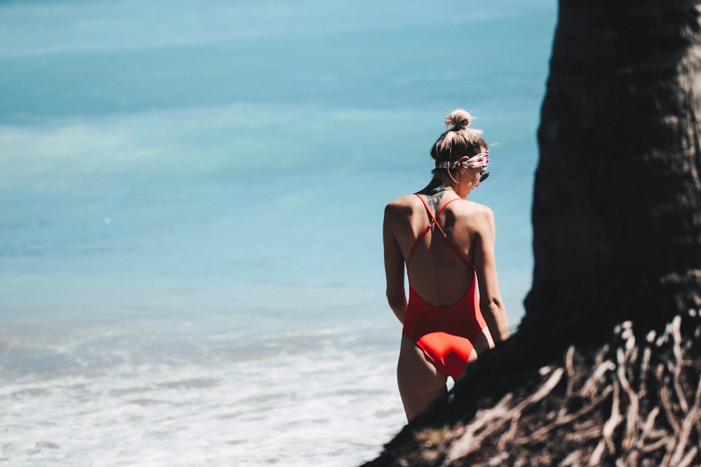 woman standing near the beach