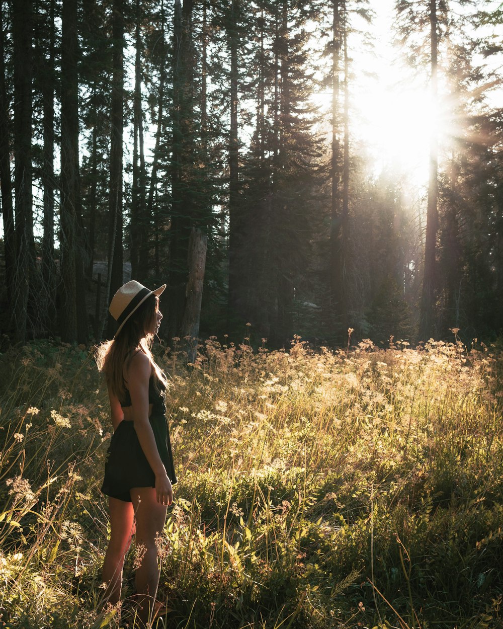 woman standing on grass field