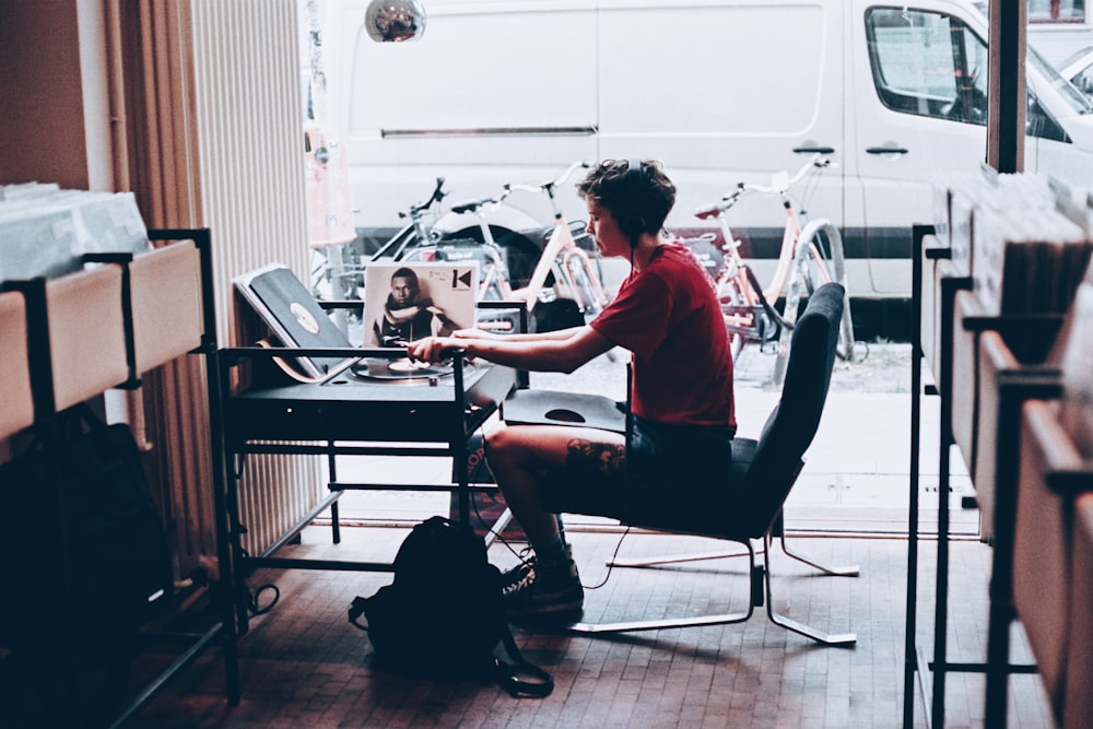 person sitting on chair