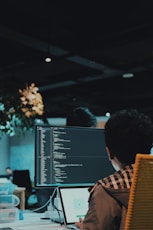 boy in front of computer monitor