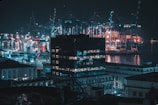 Night view of the container yard illuminated with bright lights