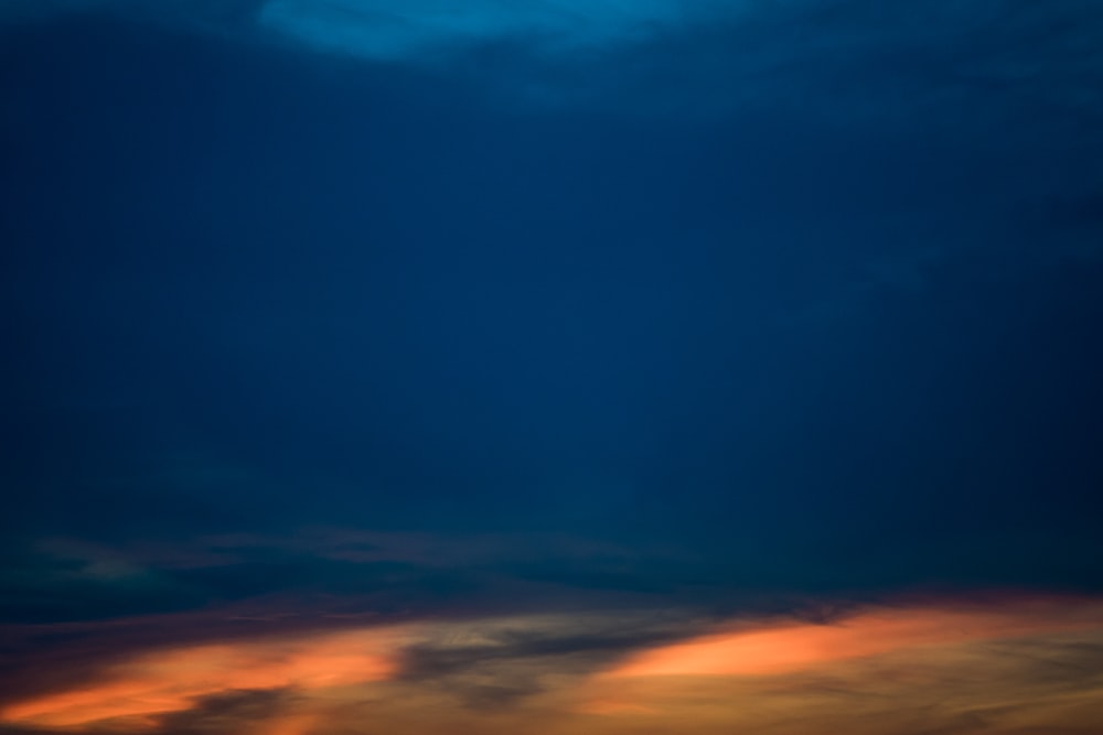 blue and orange cloudy sky