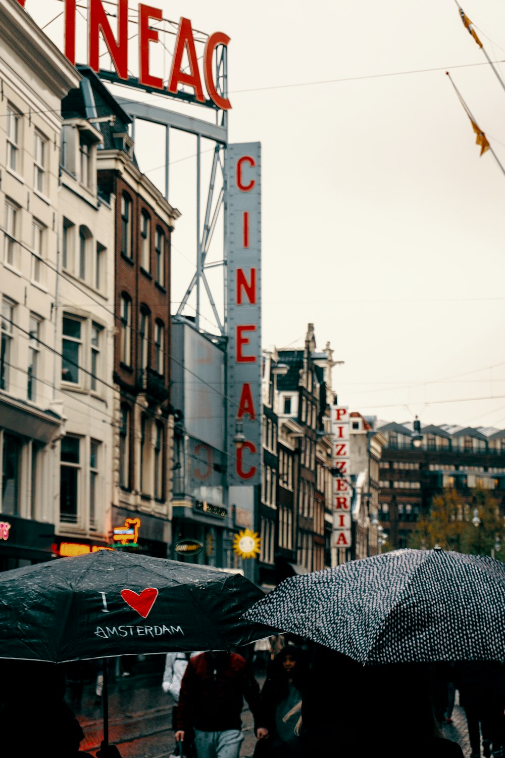 Cineac signage beside grey concrete building