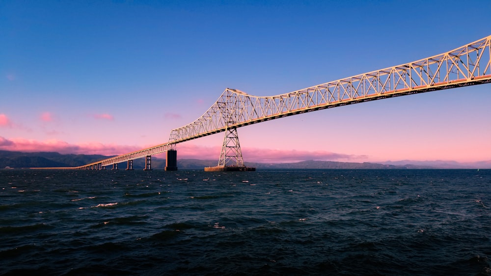 steel bridge over body of water