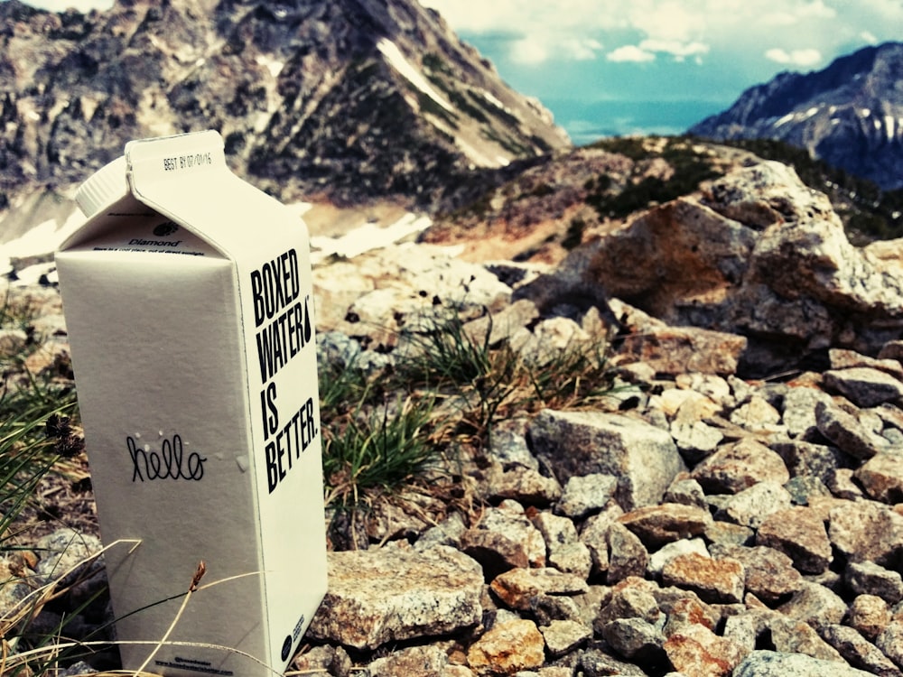 box water is better milk carton box on boulders