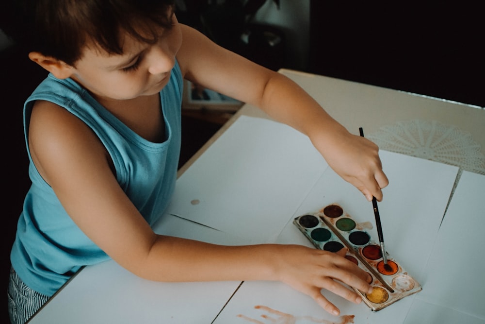 boy using watercolor