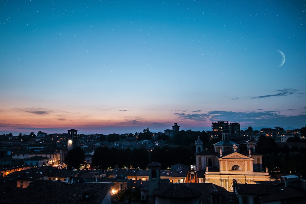 view of city buildings during sunset