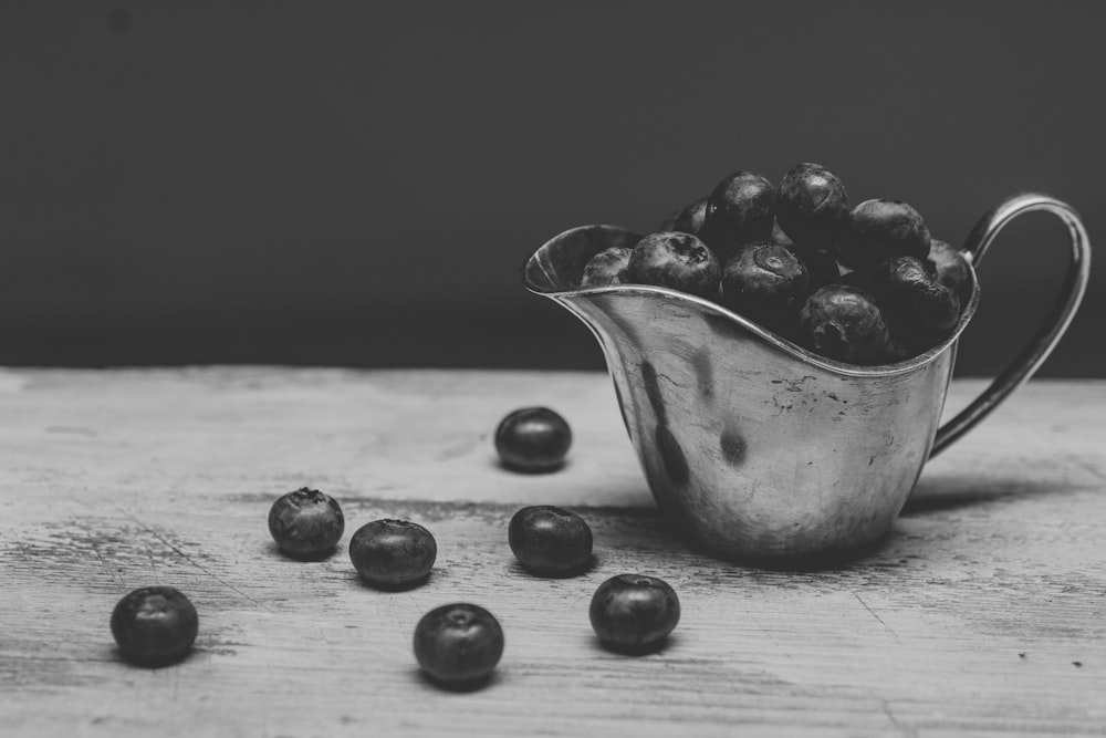 pitcher filled with berries