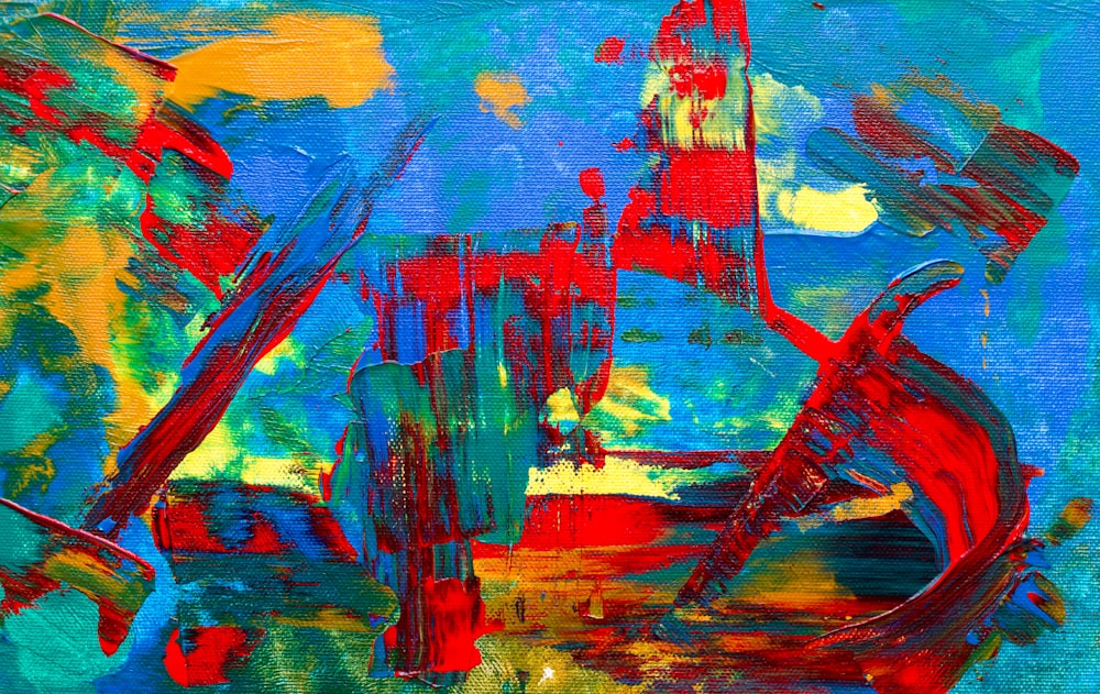 teal, red, and blue abstract painting