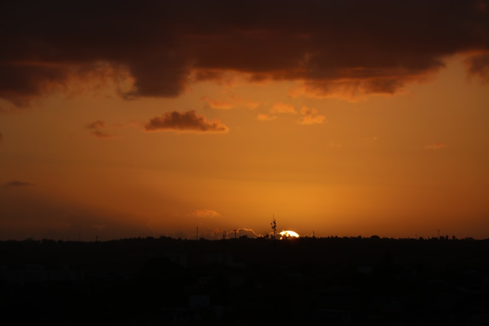 silhouette of mountain at golden hour