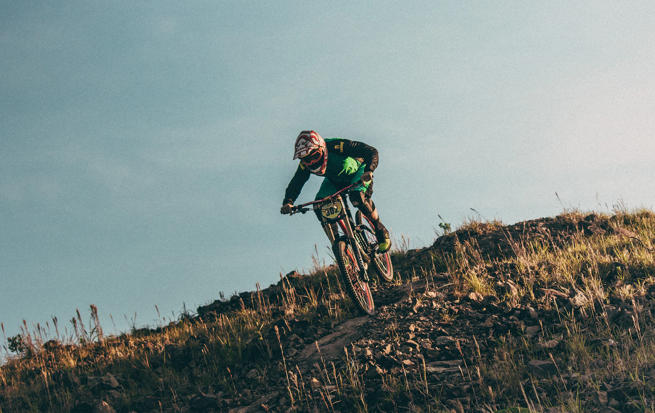 Mountain biker ripping down a trail