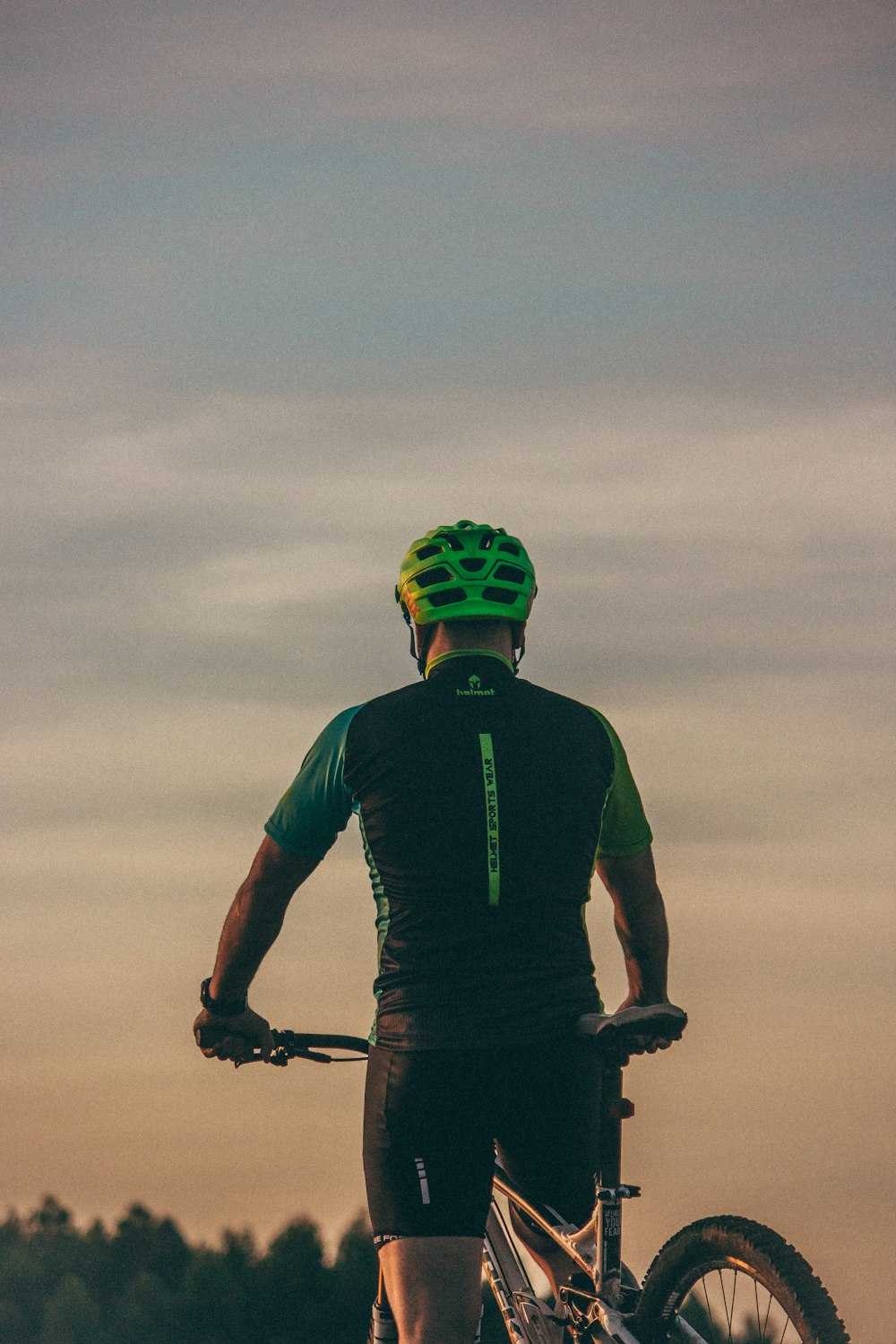 man riding bicycle during day time