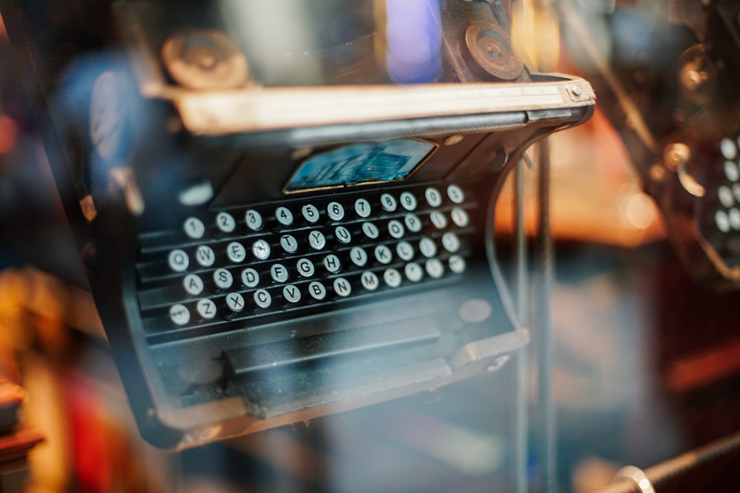 selective focus photography of black typewriter