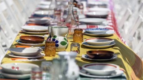 selective focus photography of dinnerware on table