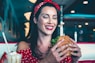 woman eats burger