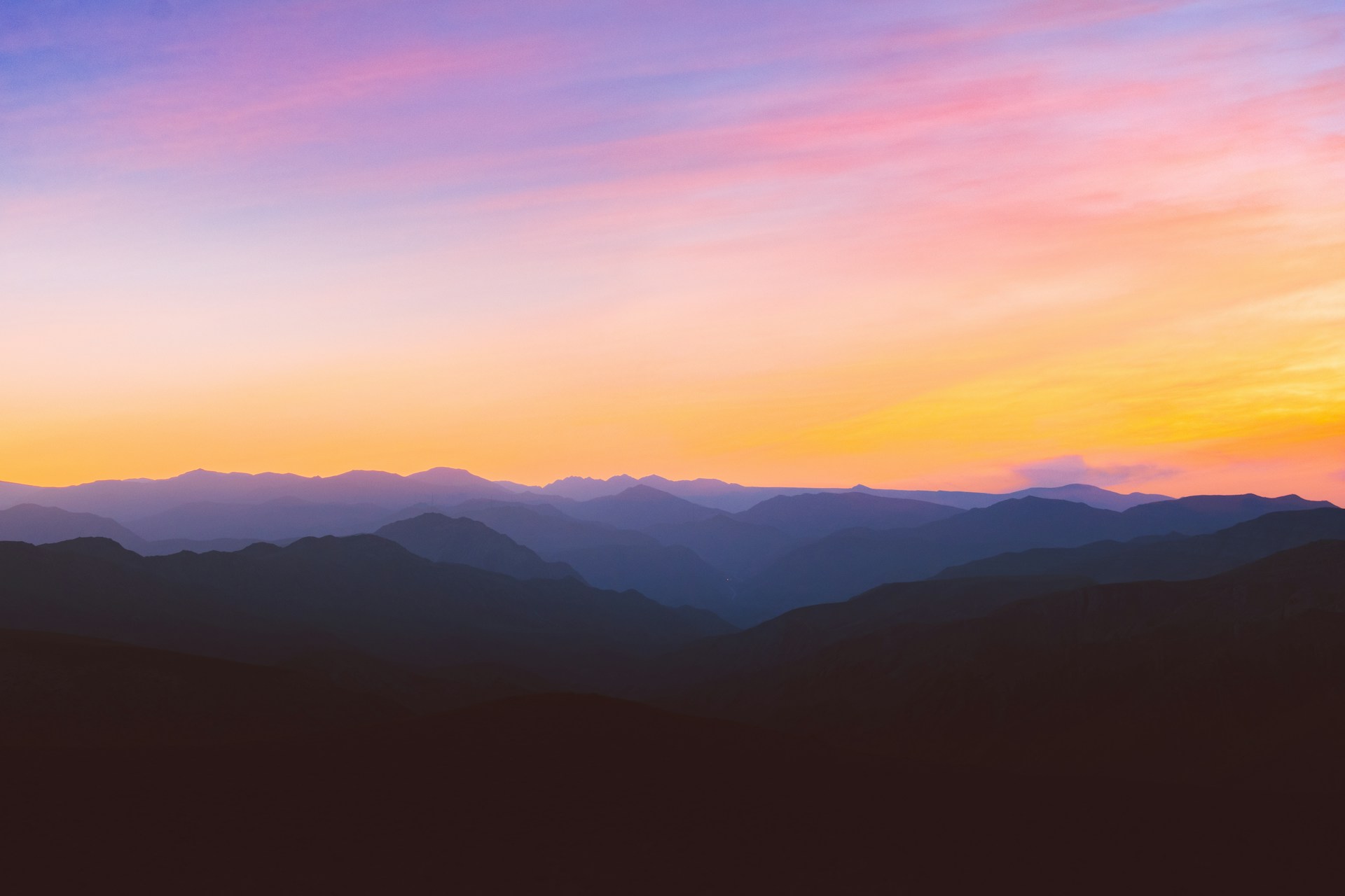 silhouette photo of mountain during golden hour