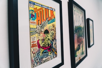 black wooden framed The Incredible Hulk comic book