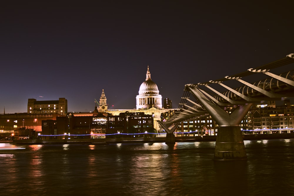 city buildings beside body of water