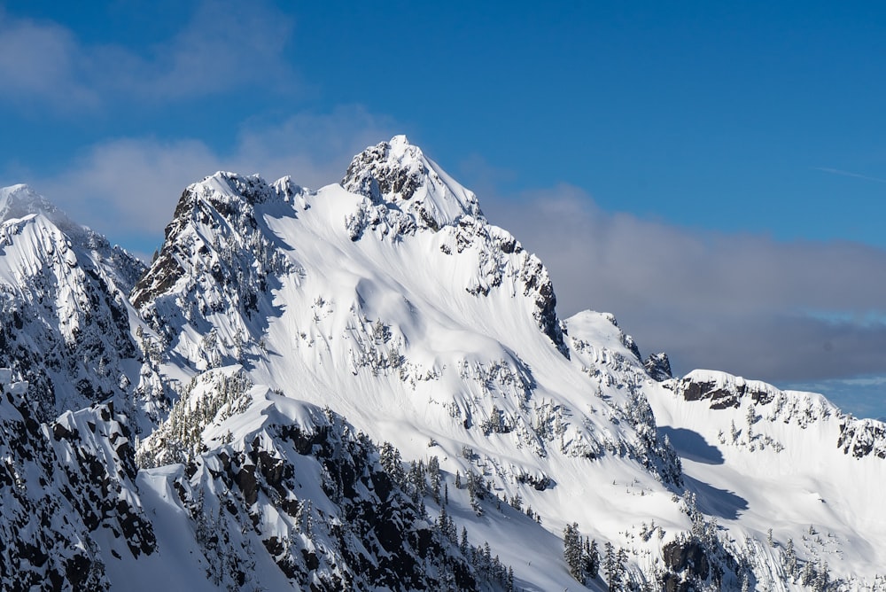 black mountain covered with snow