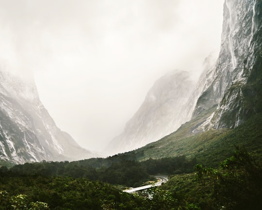mountain covered with fog in Milford Sound New Zealand