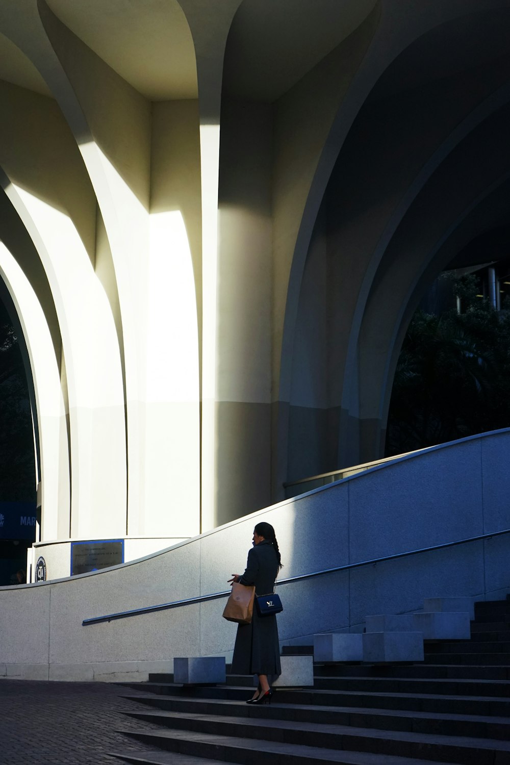 woman standing outside the building