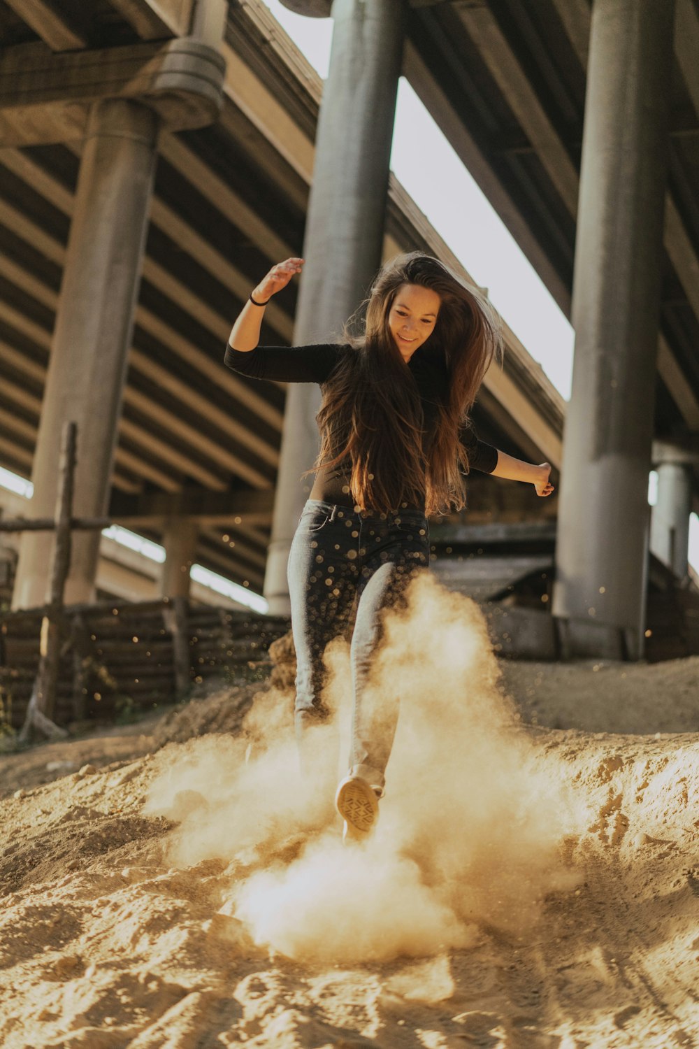 woman playing on sand