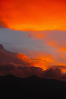 silhouette of mountain during golden hour