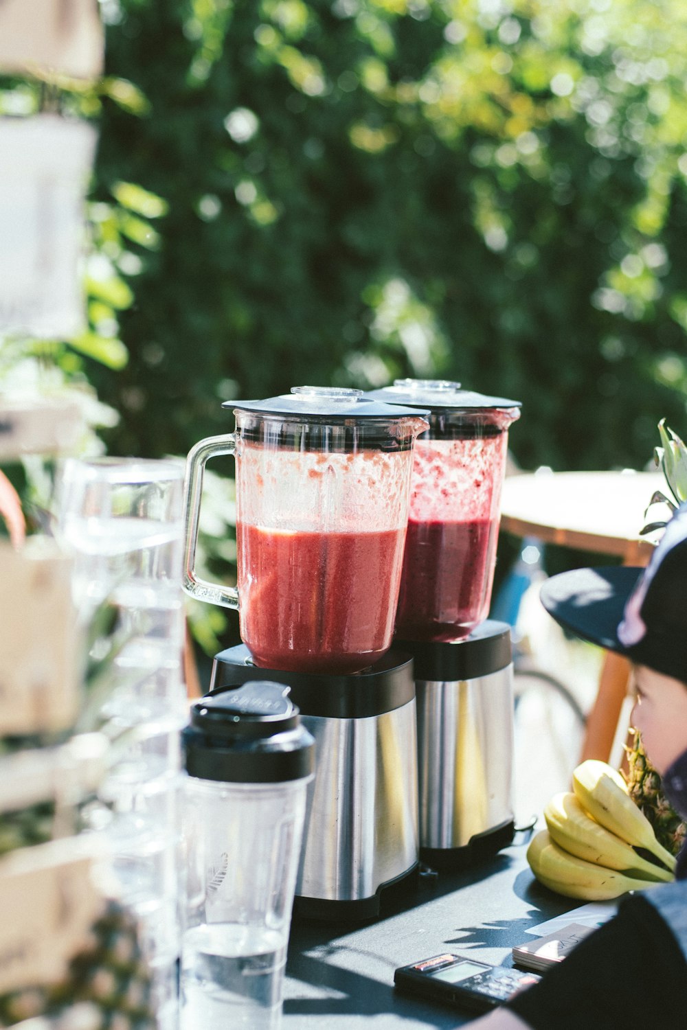 two silver electric blenders