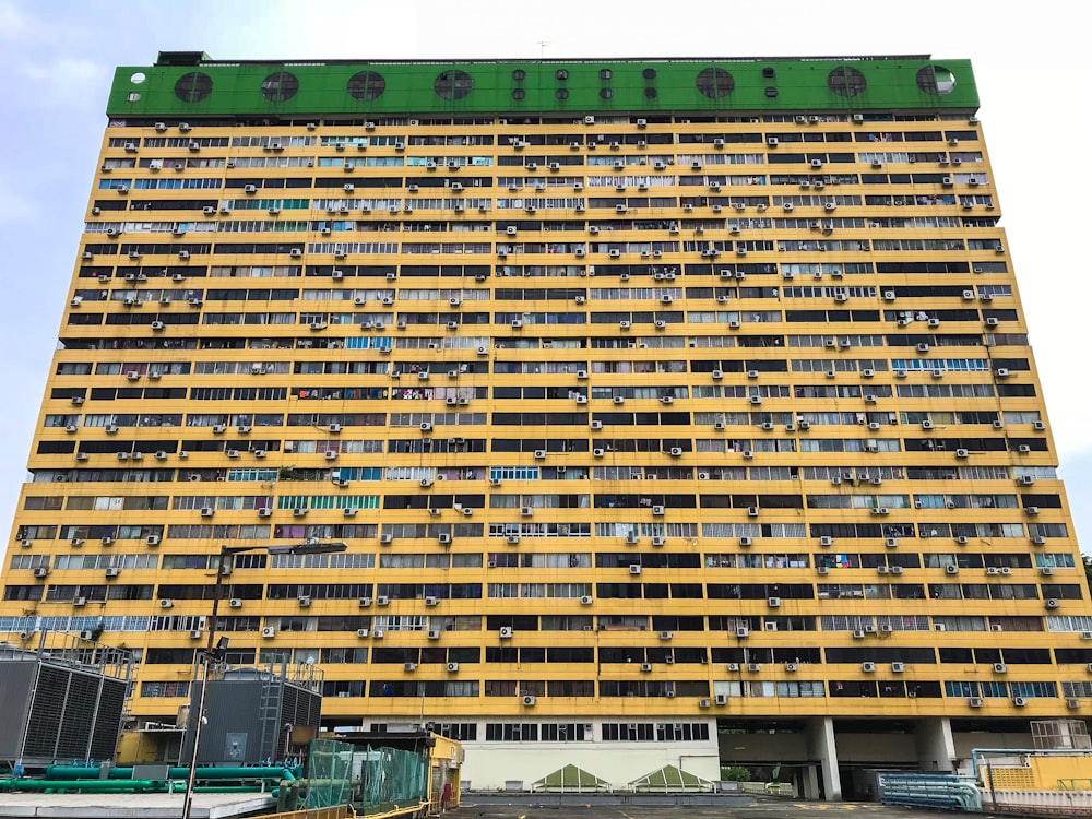 photo of green and yellow buildings