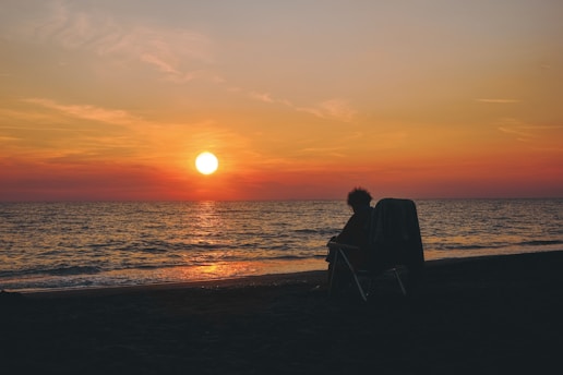 silhouette of person in shore