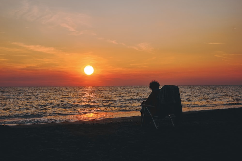 silhouette of person in shore