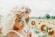woman standing on sunflower field
