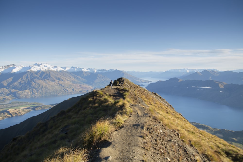 landscape photography of mountains near body of water