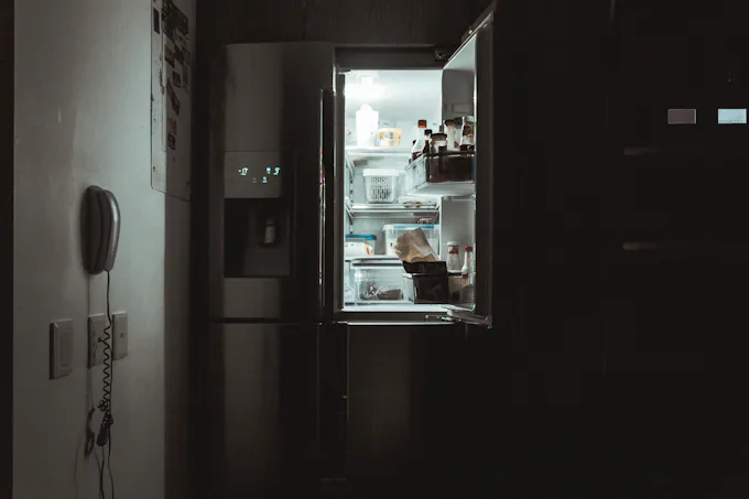 Silver French-door refrigerator in a home kitchen serviced by an Altoona appliance repair technician