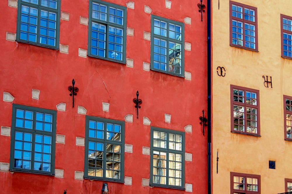 two red and brown concrete buildings