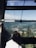 A happy customer enjoying a scenic view during their trip arranged by SLV Tours.
