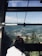 A happy customer enjoying a scenic view during their trip arranged by SLV Tours.