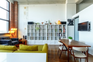 Modern living room with natural light and eco-friendly furniture.