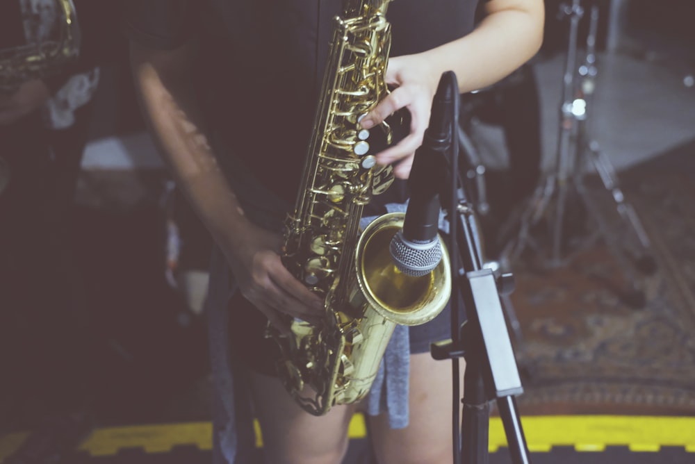 woman playing saxophone