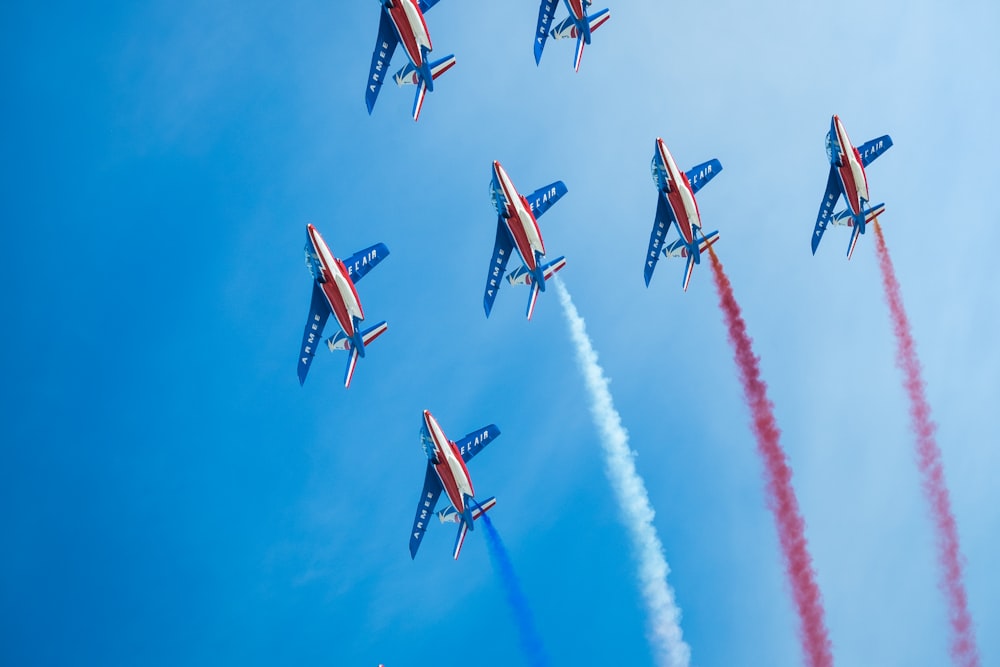 time lapse photography of airplane with smoke