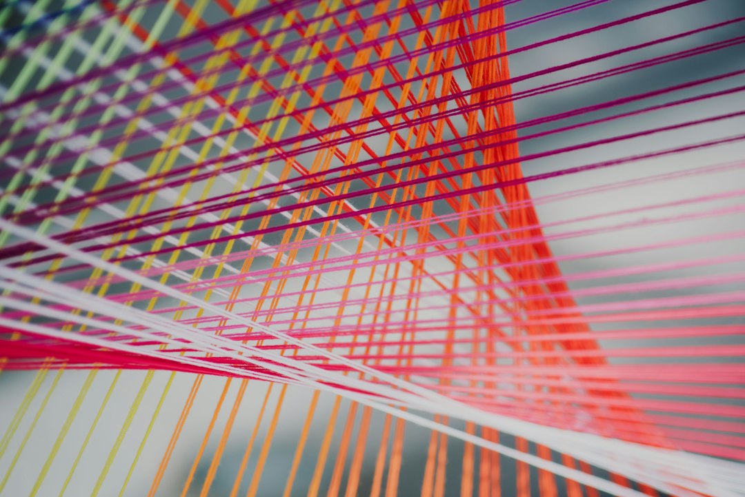 Fine intertwined strings illustrating stringing