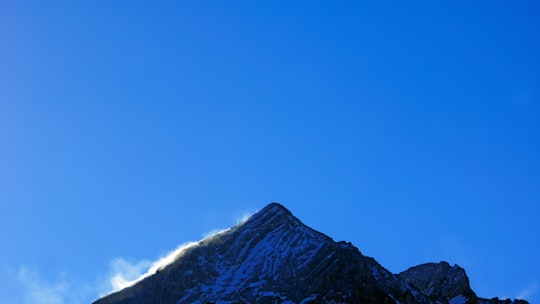 rock mountain under blue sky during daytime in Seefeld Austria