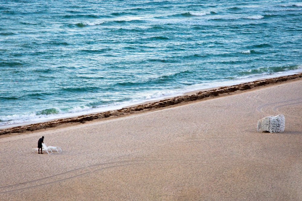 man on white sand