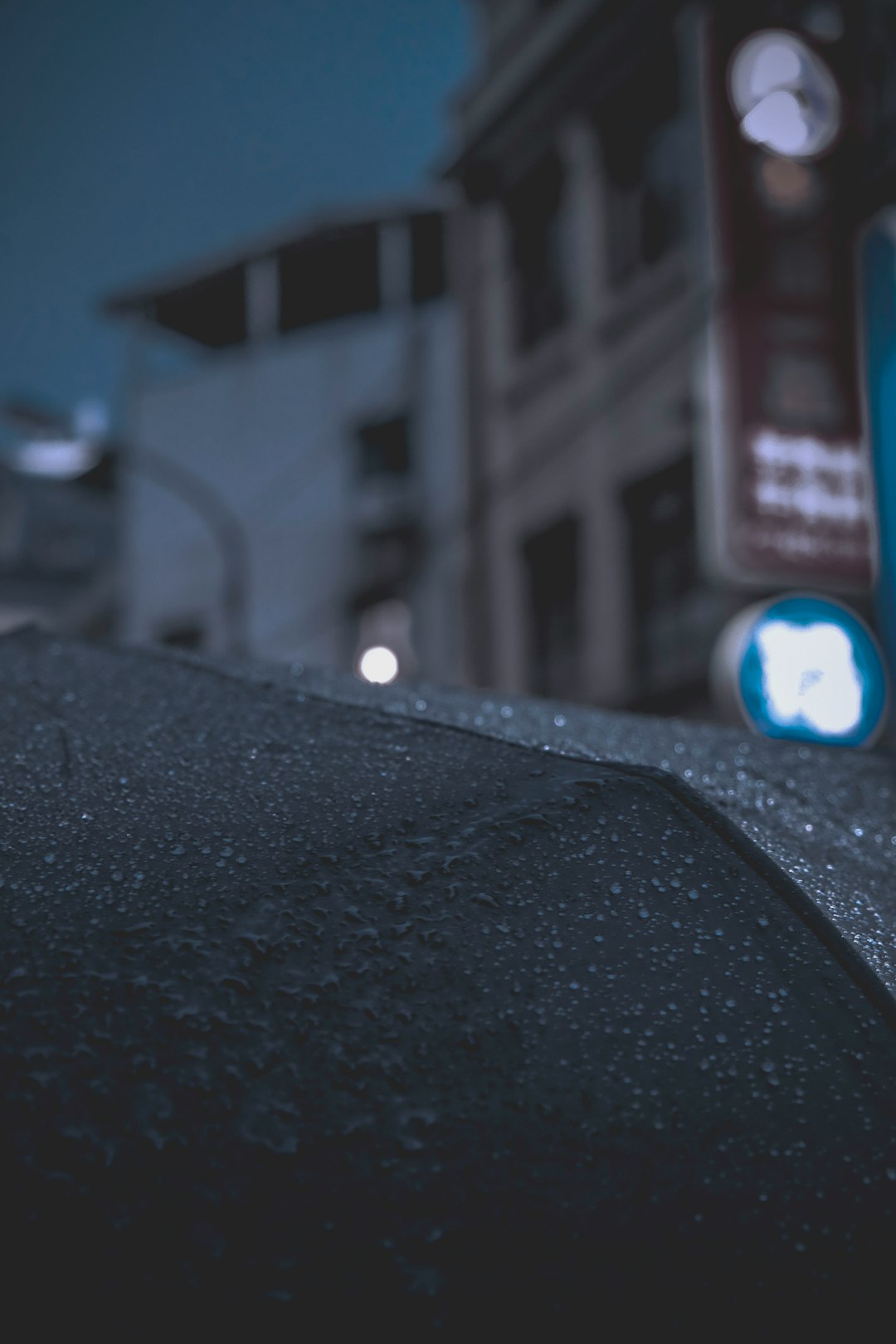 water drops on black umbrella