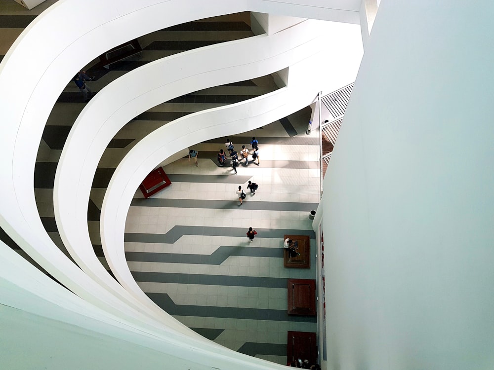 high-angle photography of white building interior