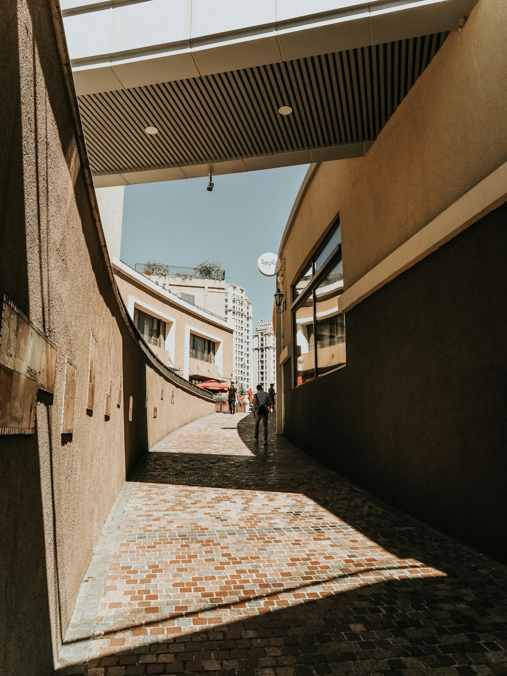 person in narrow street